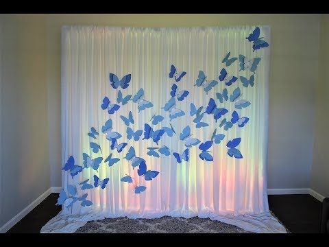 Cortina con mariposas y luces para backdrop